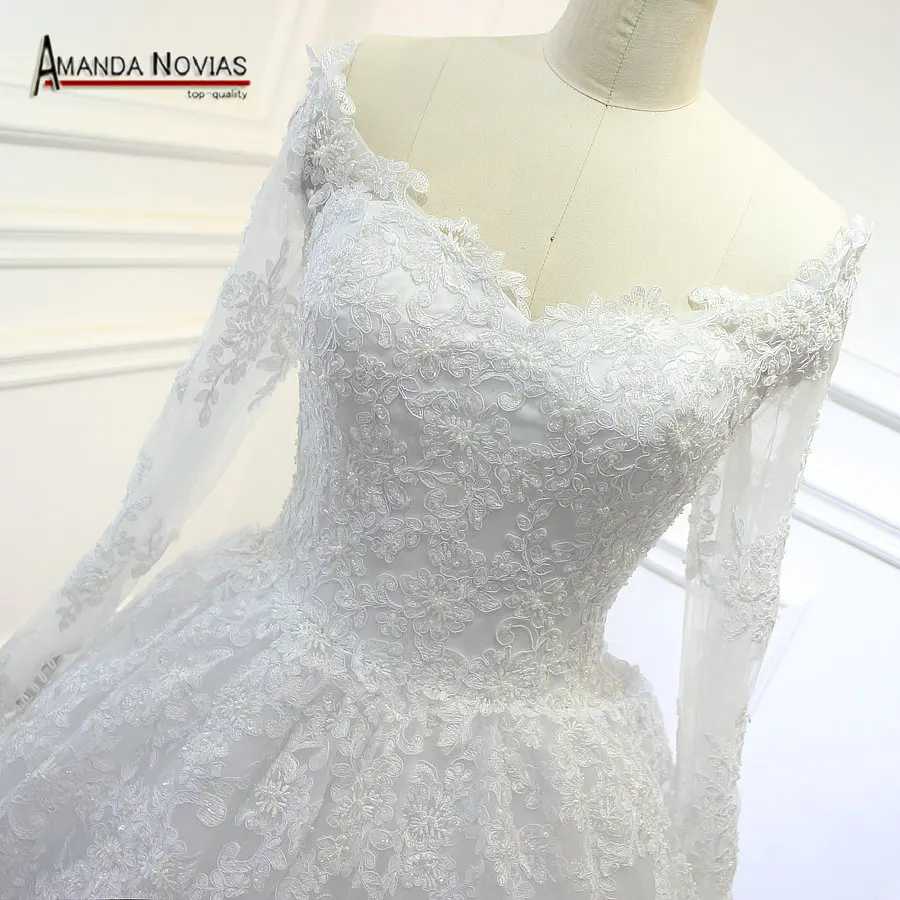 

Sweetheart Long Sleeve Long Train Ball Gown Wedding Dresses Amanda Novias Real Photos 2019