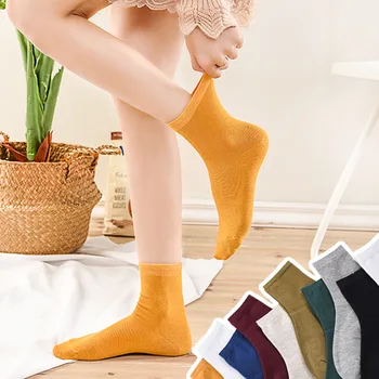 

New Japanese women's cotton socks in the high tube solid color sweat-absorbent breathable socks