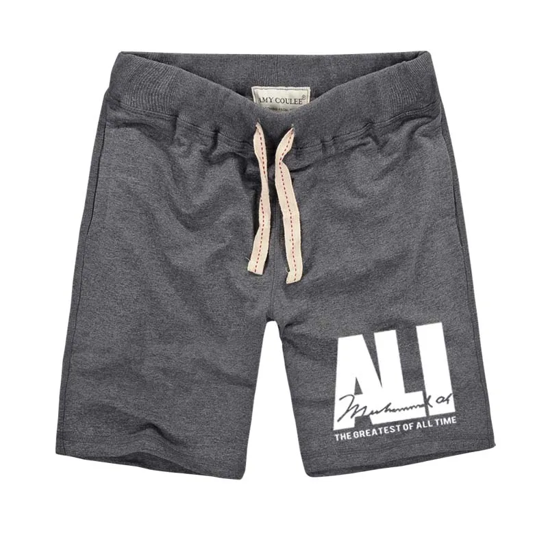 homens muhammad ali nome letra shorts aptidão