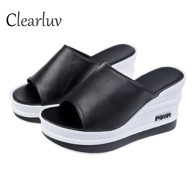 

Wedge slippers 2019 summer new high-heeled anti-skid sandals sponge cake thick bottom wild hollow fish mouth sandals beach women