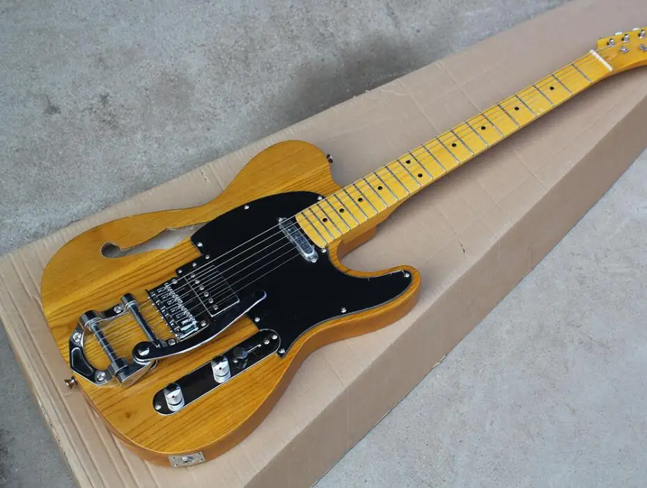 

ASH body Electric Guitar with Black Pickguard,Yellow Maple Neck with tremolo system Chrome Hardwares,offer customized