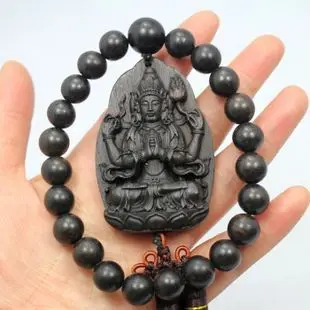 

Natural ebony, handmade wood carving, esoteric four arm Guanyin, automobile decoration