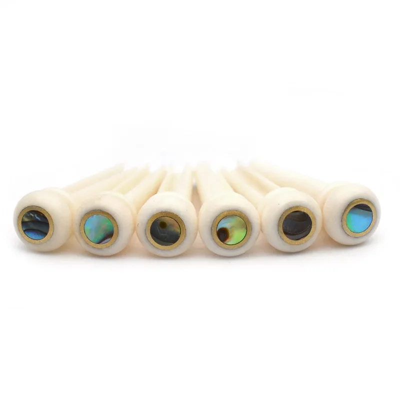 

6 pcs/set Natural OX Bone Guitar Bridge Folk Acoustic guitar Pin guitarra strings Peg string Nail Increase sustain abalone shell