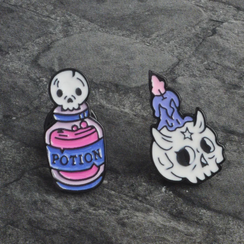 

MINGQI 2pcs/set Cartoon skull skeleton candle black magic book potion enamel brooches coat pin bag badge halloween Jewelry Gift