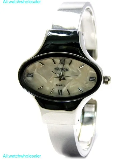 NATURAL Elliptic PNP Shiny Silver Watchcase Women Beige Dial Bangle Watch FW573A