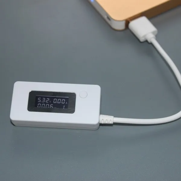 

Free Shipping Real tracking number LCD USB Mini Voltage and Current Detector Mobile Power USB Charger Tester Meter