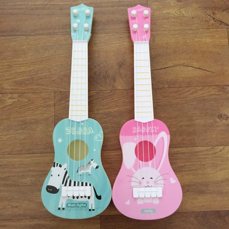 Детский искусственный музыкальный инструмент в укулеле, мини-гитара Мини-укулеле, играющая в образование, музыкальная игрушка для раннего детства Int