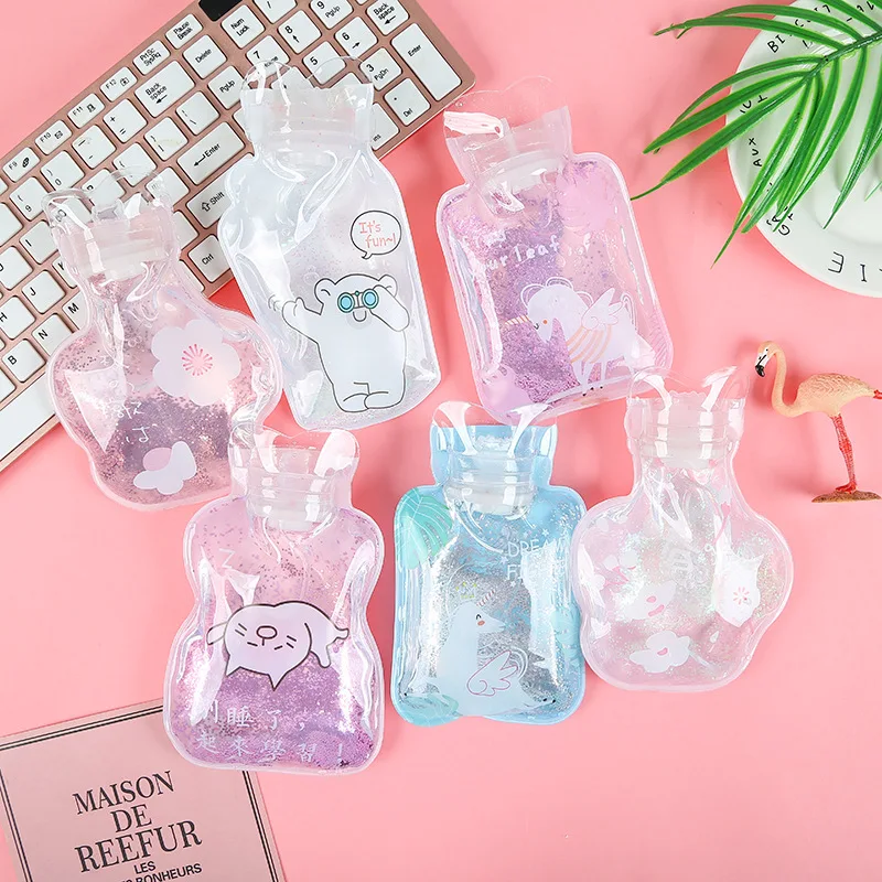 

1PC Creative Quicksand PVC Small Transparent Hot Water Bottle Female Student Portable Mini Hot Water Bottle 11.2*15.5CM 16 Style