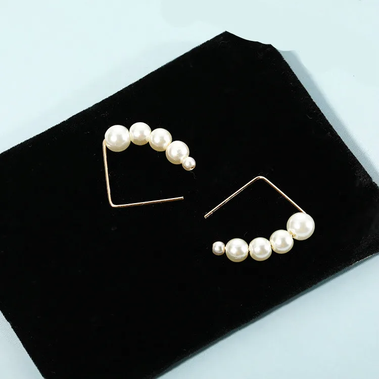 

Korean Fashion New Minimalist Pearl String Earrings Port Wind Earrings Ladies Temperament Cold Wind Net Red Simple Earrings