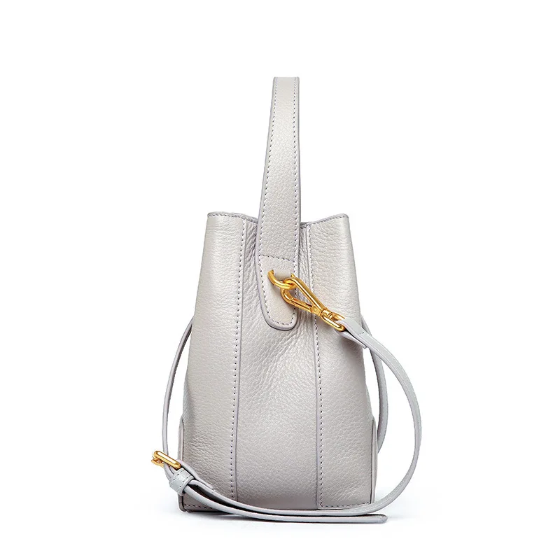 Elegant and refined solid color lychee leather female bucket bag large capacity lock and open the door of women leather handbags