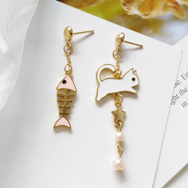 Show off your creative and fun side with a pair of these cool Cat Fish Bone Asymmetry Earrings lolithecat.com