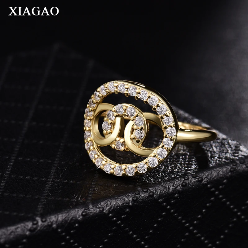 XIAGAO большая акция Новое модное кольцо для женщин золотого цвета Кристалл кубический циркон цветок кольца группа обручальные ювелирные изделия XGA061
