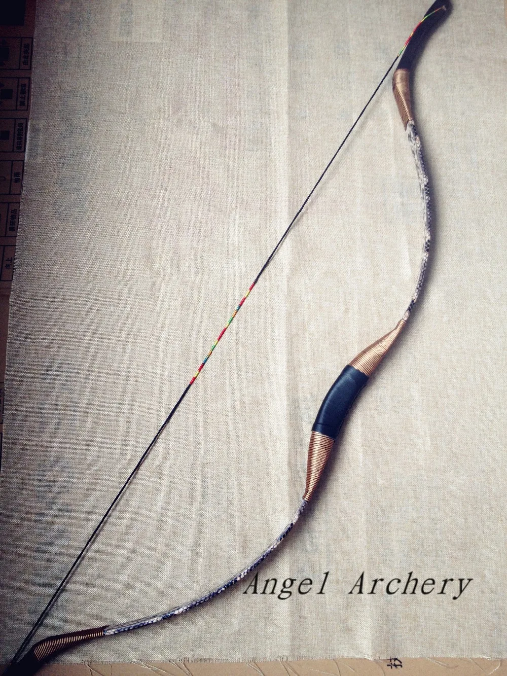 

Low price good quality Nice snakeskin longbow Archery Longbow Hand-made Recurve Bow hunting bow20lbs-60lbs