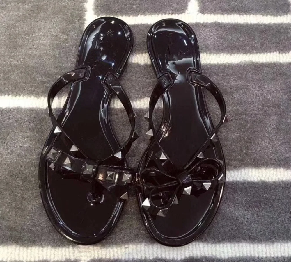 

European style Summer bowtie Jelly flip flops Fashion women rivets Jelly shoes Chic beach shoes EU35-41 size BY404