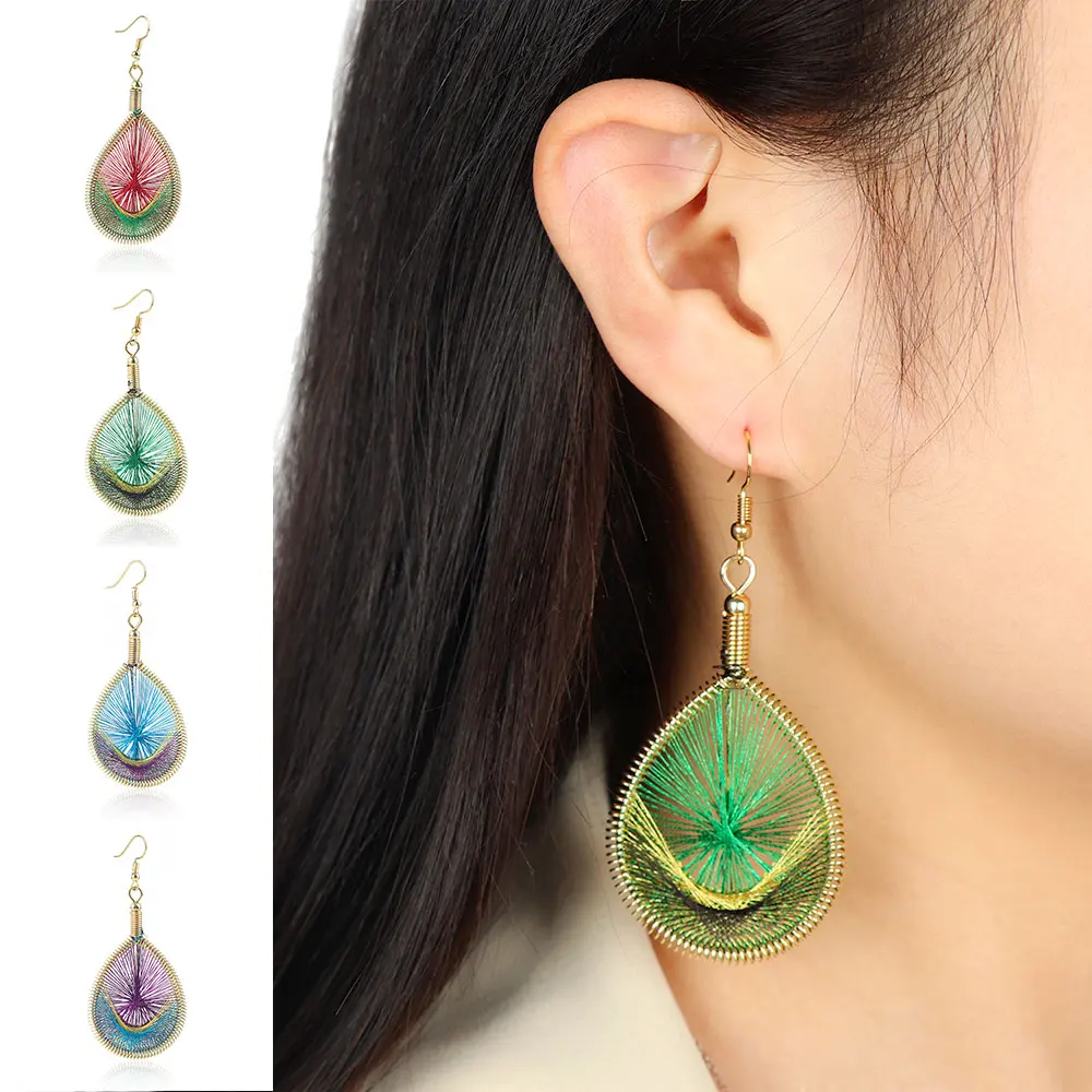 

1 pair Vogue Women Elegant Cute Peacock tail wire Gold thread Ear Earrings Jewelry pendientes etnicos