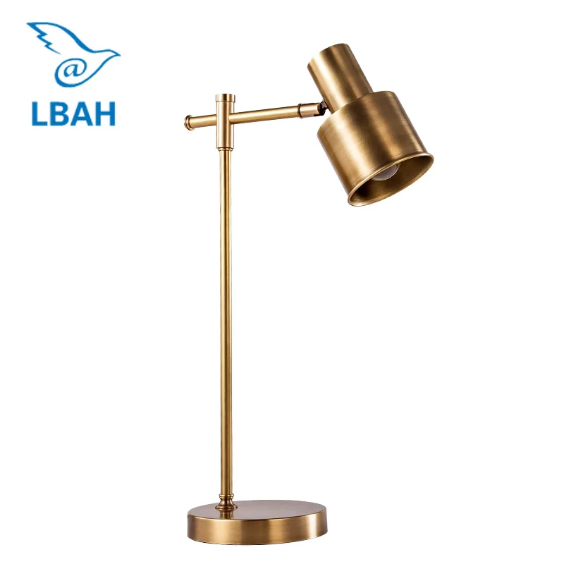 

American post - modern simple bedroom bedside table lamp model room creative metal desk lamp