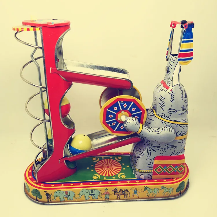 

Adult Collection Retro Wind up toy Metal Tin Elephant play ball Mechanical toy Clockwork toy figures model kids christmas gift