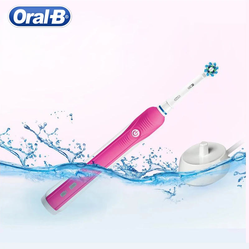 Электрическая зубная щетка Oral B регулируемая со сменной головкой лучший подарок