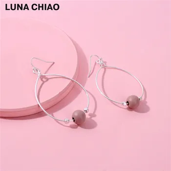 

Big Water Drop Cooper Wire Lacqured Metallic Colored Wood Bead hoop Earrings for women