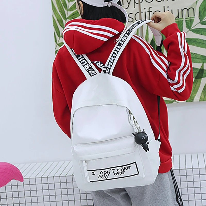2019 nueva Mochila de lona de moda las mujeres Mochila muñeca de colgante de las mujeres bolsa de hombro Harajuku Mochila mujeres Mochila