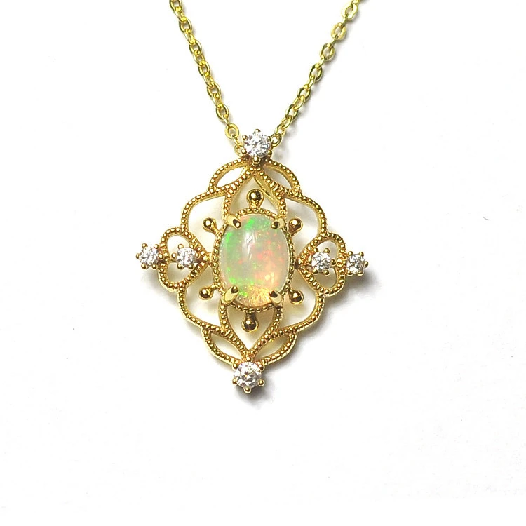 

Natural Opal Pendant , Light GOLD 925 pure silver. Main stone: approximately 8*6 elliptical prime surface opal.