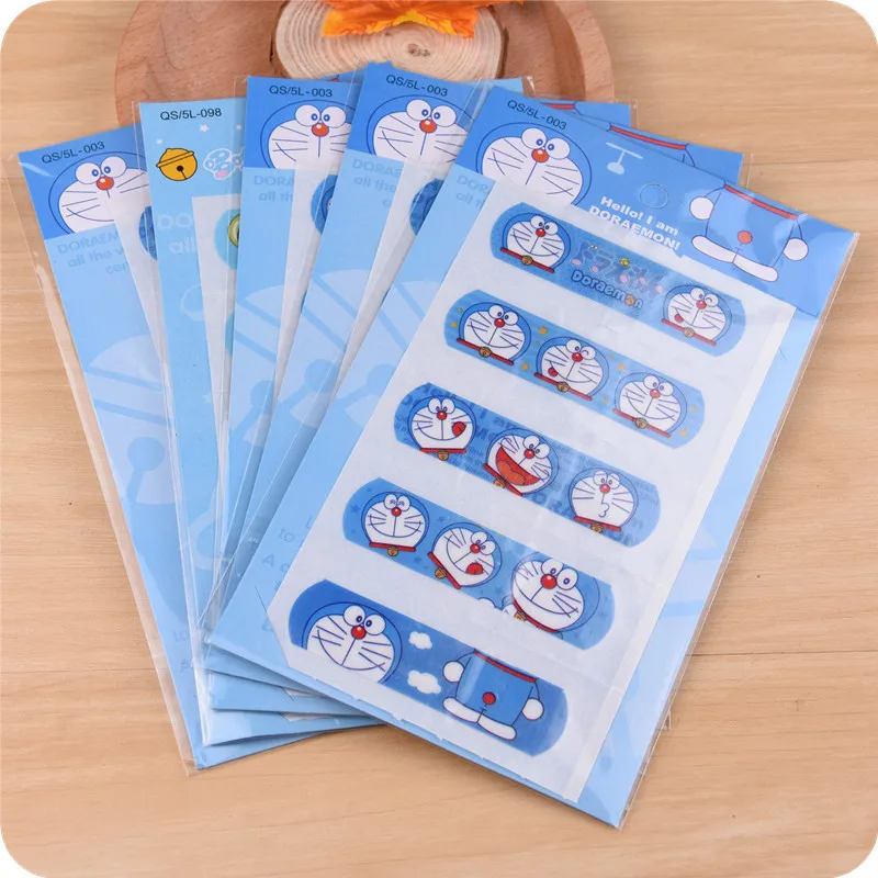

20 Set/100 Pcs Cute Hello Kitty Doraemon Waterproof Band-Aid Bandage Sticker Baby Kids Care First Band Aid Travel Emergency Kit