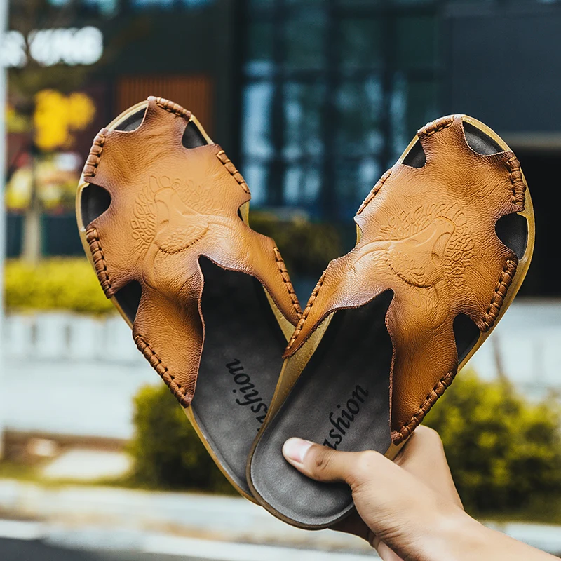 

Summer leather men's slippers outside wearing soft non-slip leather sandals large size beach shoes half-draft head hole sandals