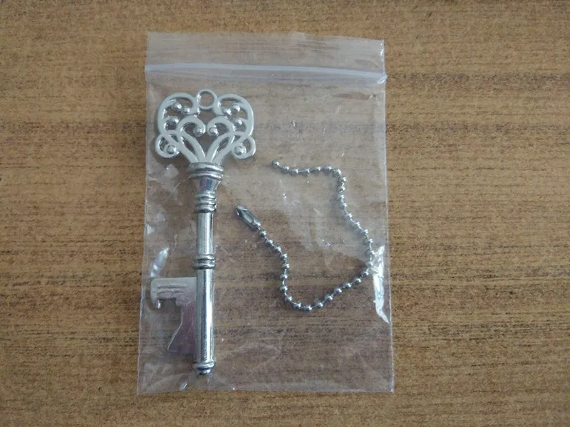 

hot sell 100pcs/lot key bottle opener for beer and wine with good quality