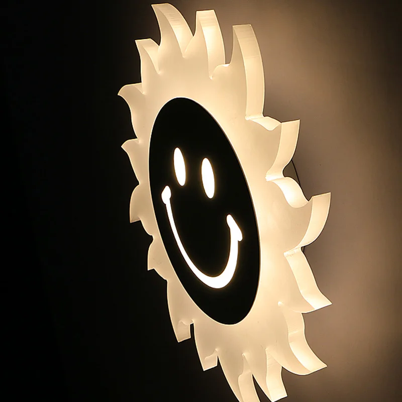 

Sunflower smile creative wall lamp bedroom highlight does not dazzling LED wall lamp energy - saving acrylic reading wall lamp