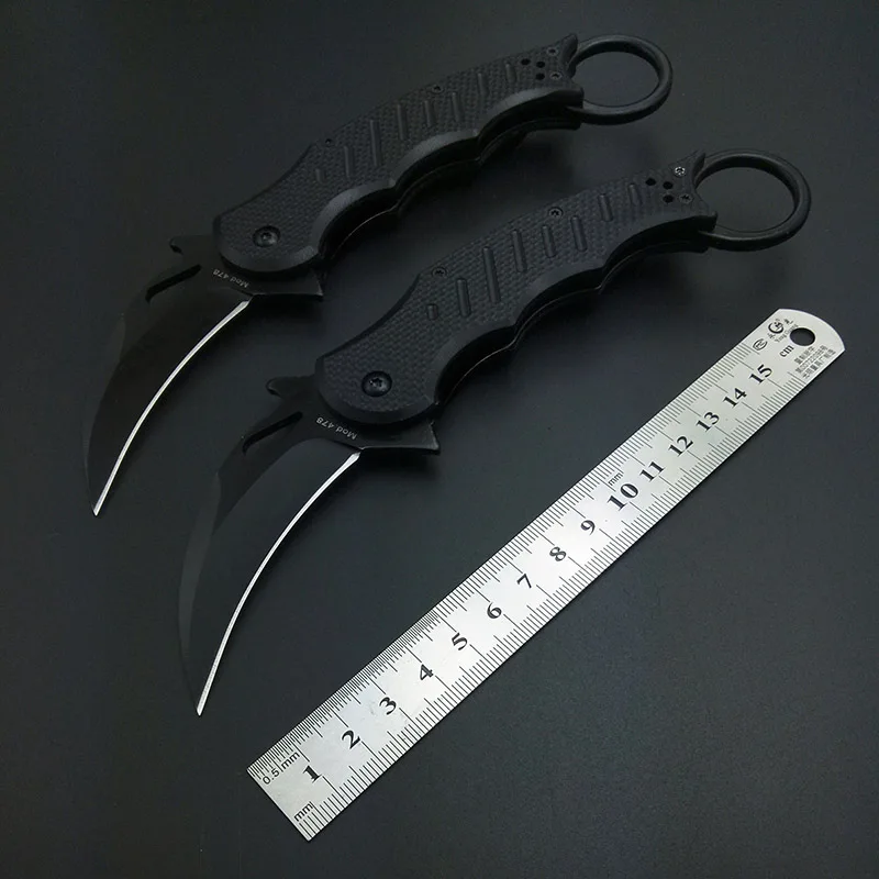 Baratos Táctico Karambit cuchillo plegable Camping caza cuchillos de supervivencia de G10 manija de acero inoxidable profesional Karambits EDC