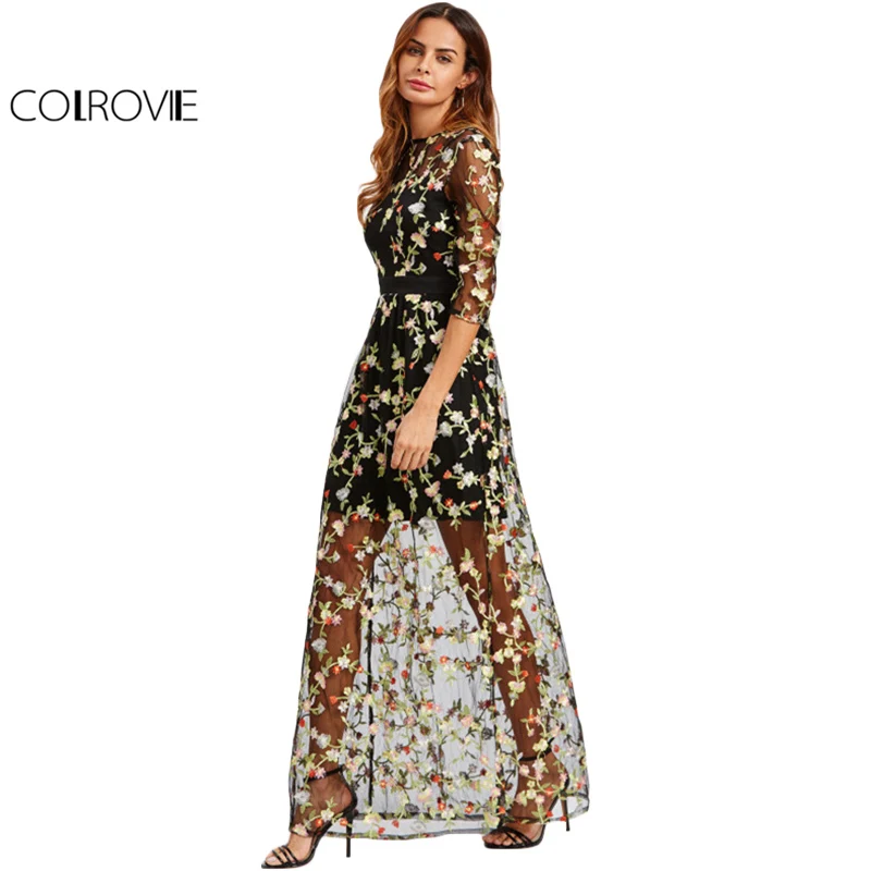 black dress with floral overlay
