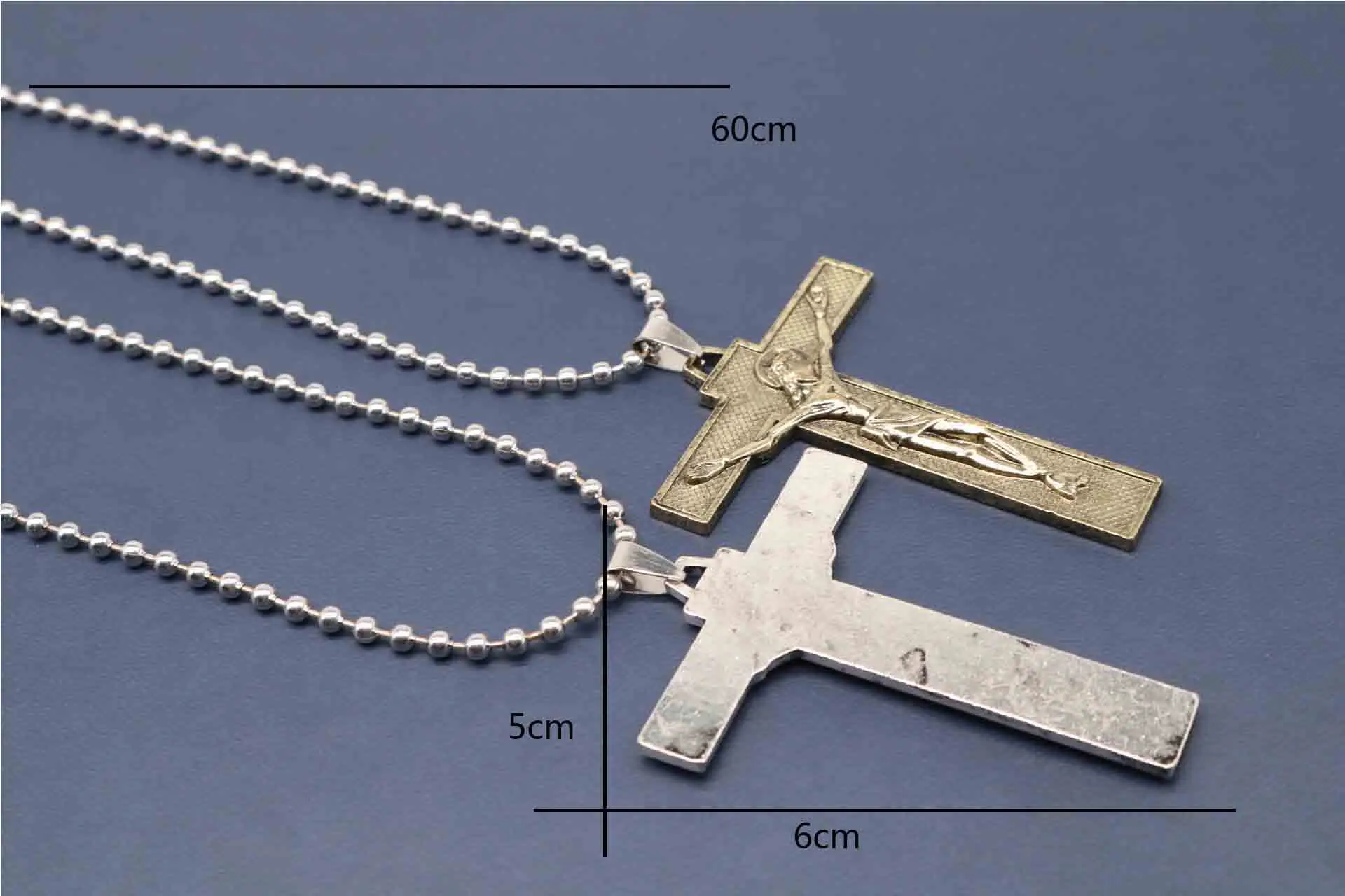 New religion. Long chain of Christian Cross. Fashion crosses. String