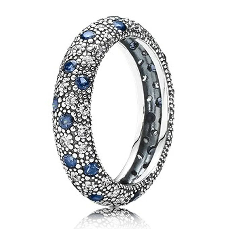Authentic 925 sterling silver ring entwined ribbon with blue crystal