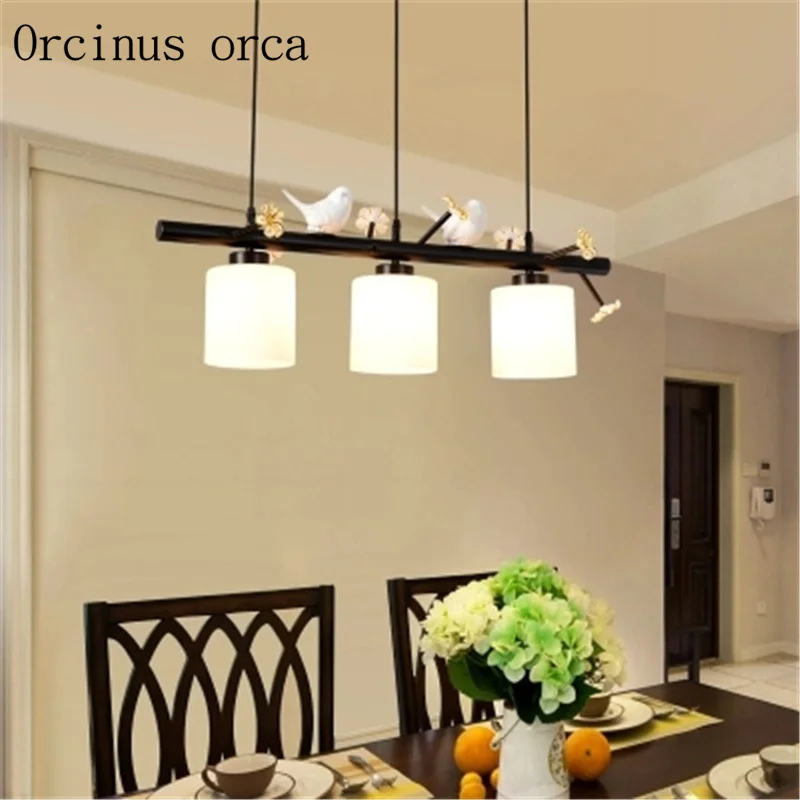 مطعم الثريا الحديثة الحد الأدنى ثلاثة الإبداعية طاولة طعام مصباح الأزياء شخصية الطعام غرفة LED غرفة المعيشة مصابيح