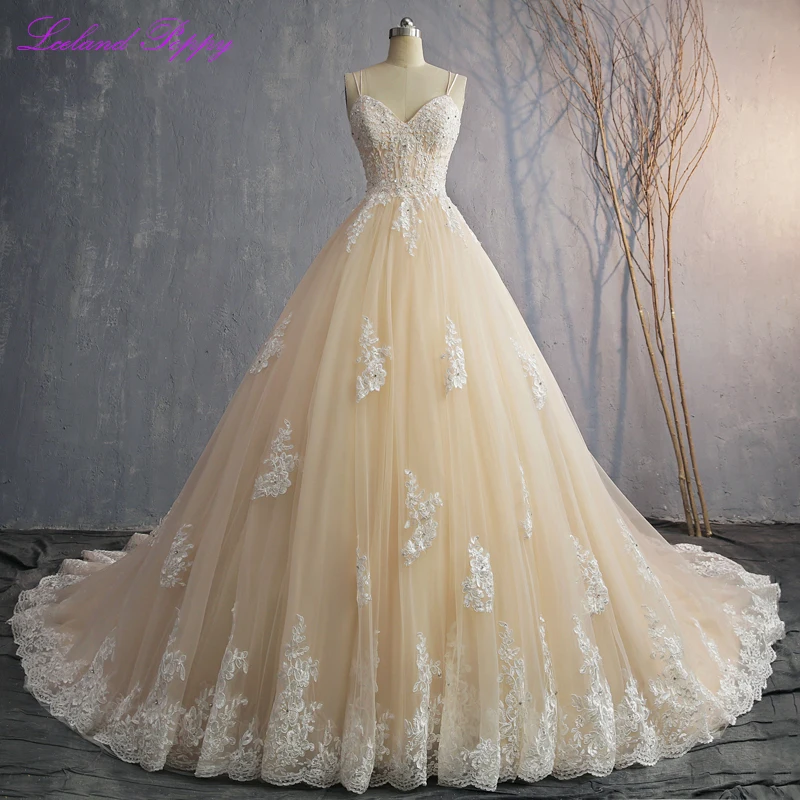 

Women's A-line Lace Appliques Sleeveless Wedding Dresses Floor Length Beaded Sweetheart Neckline Spaghetti Straps Bridal Dress