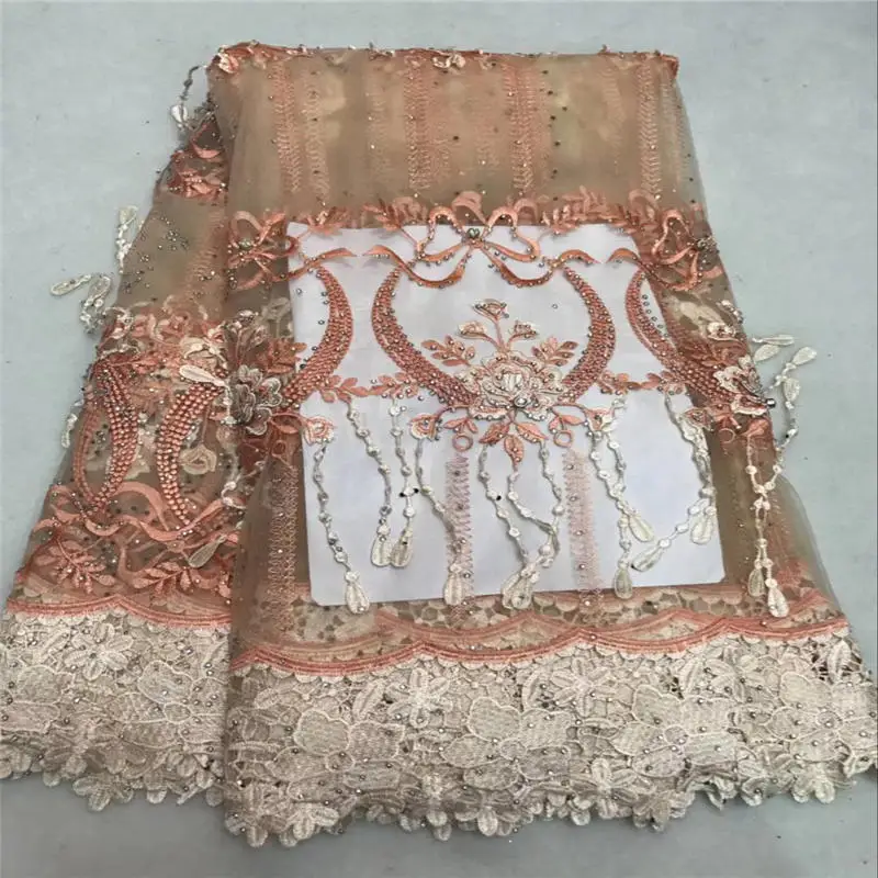 

Latest African Laces Fabrics Embroidered African tulle French Lace Fabric with a lot stones peach color french mesh lace