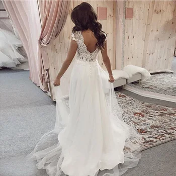 

Simple V-neck Boho Wedding Dresses A-line Lace Appliques Elegant Bridal Gowns Cap Sleeves Backless Sweep Tain Vestidos De Noivas