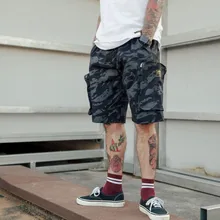 Лето г. Карманы бриджи с низкой талией уличная хип хоп для мужчин повседневное Тактический короткие мотобрюки мужской Homme шорты для женщин черный