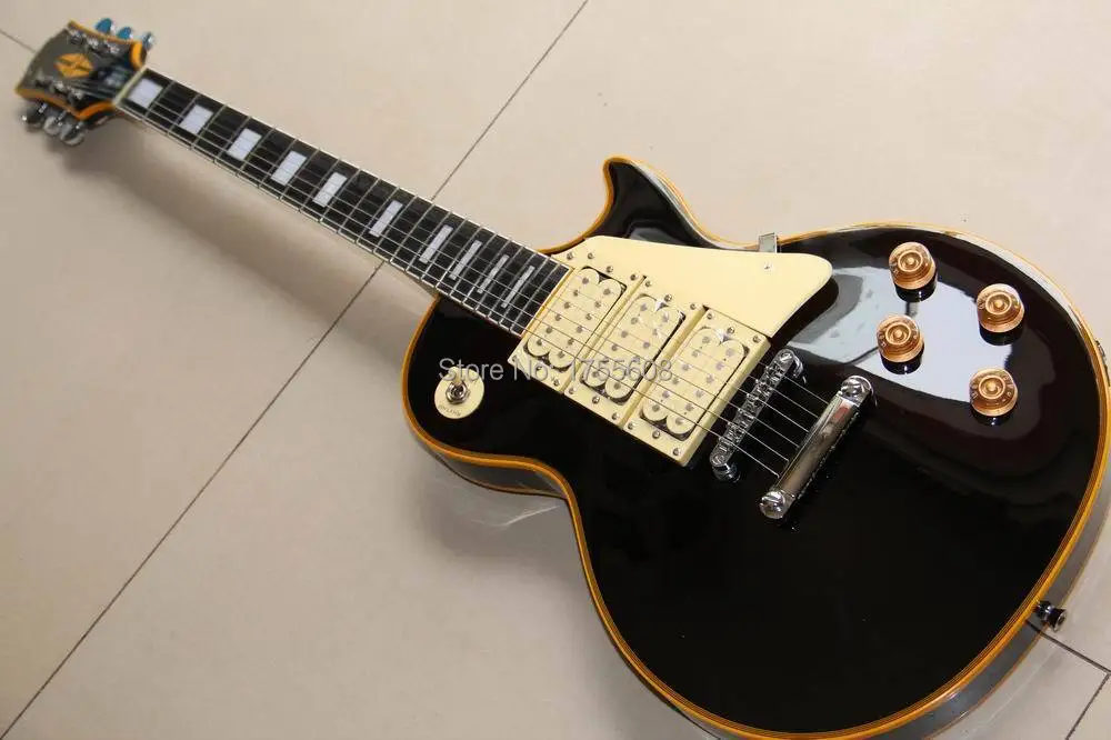 

Customized Orders Ace Frehley Budokan VOS LP Custom Electric Guitar aged yellow side binding black Free Shipping 120925