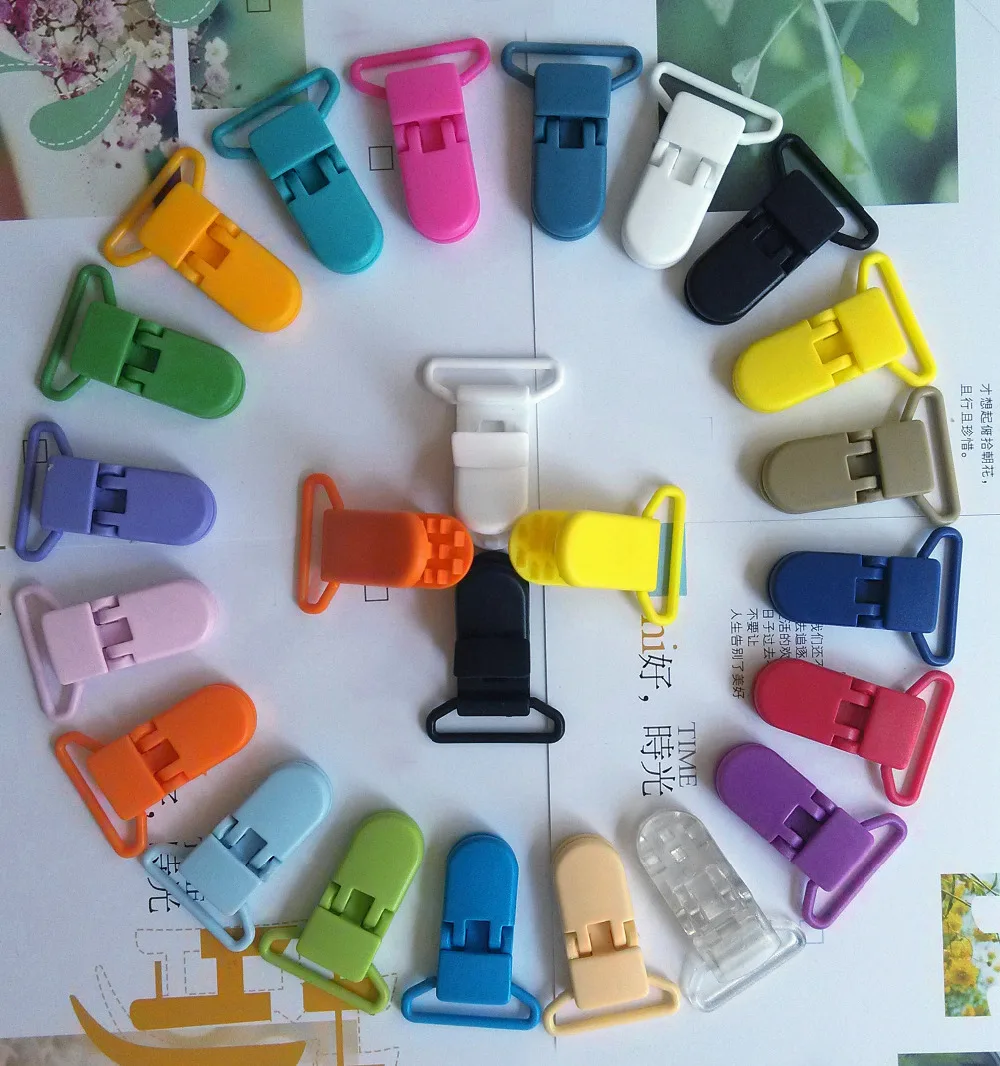 

Free Shipping 150pcs/Lot 25MM D shape Plastic Pacifier Clips,Plastic Clamp,Soother / Suspender / Dummy Clip 20 Colors