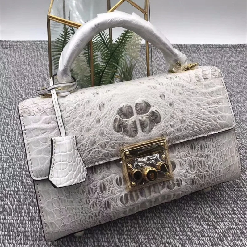 white alligator purse