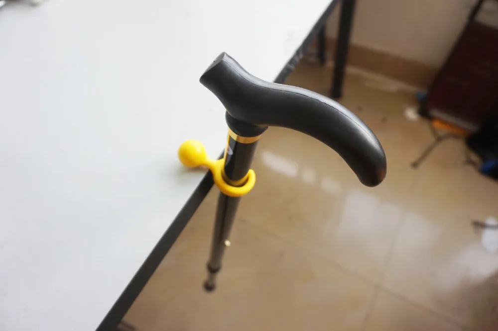 

Easy-to-Use Desk or Table Clip Walking Stick Cane Holder - Clip On Table Rest
