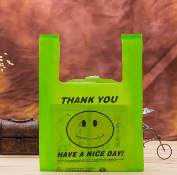 50 шт./лот маленький розовый спасибо пластиковые подарочные пакеты с ручкой, красочные полиэтиленовые пакеты улыбка супермаркет пластиковый мешок жилет - Цвет: Зеленый