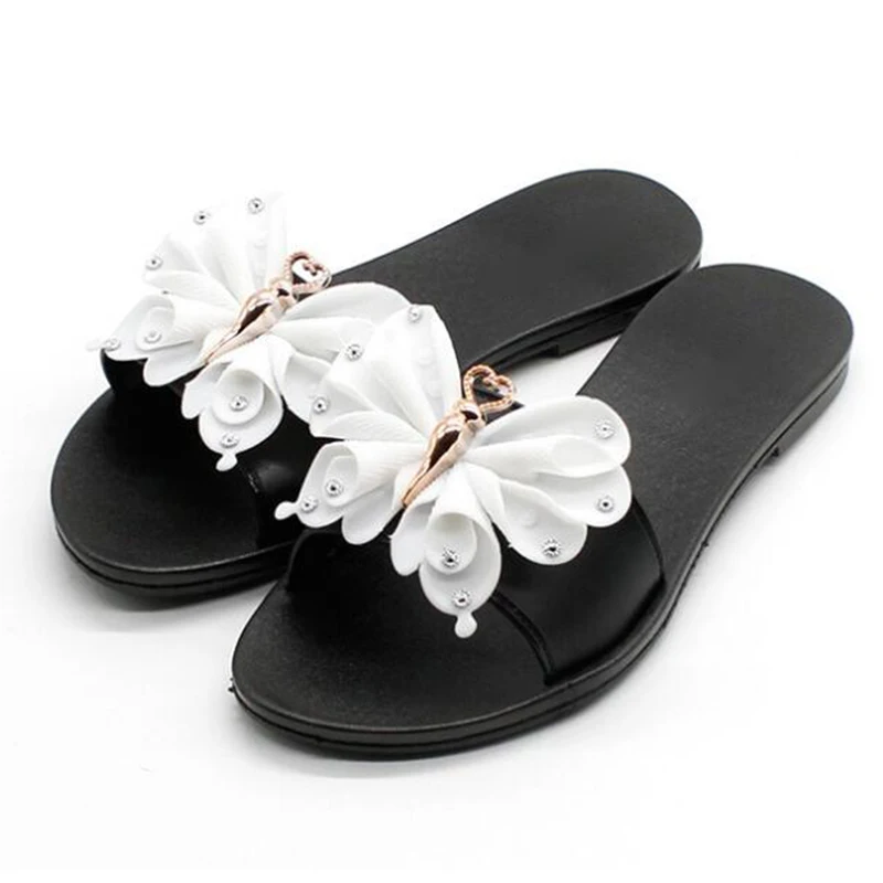 black slides with bow