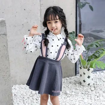 

Anlencool Children's suit 2020 spring and autumn new baby long-sleeved ruffled polka dot shirt + girls cartoon straps skirt set