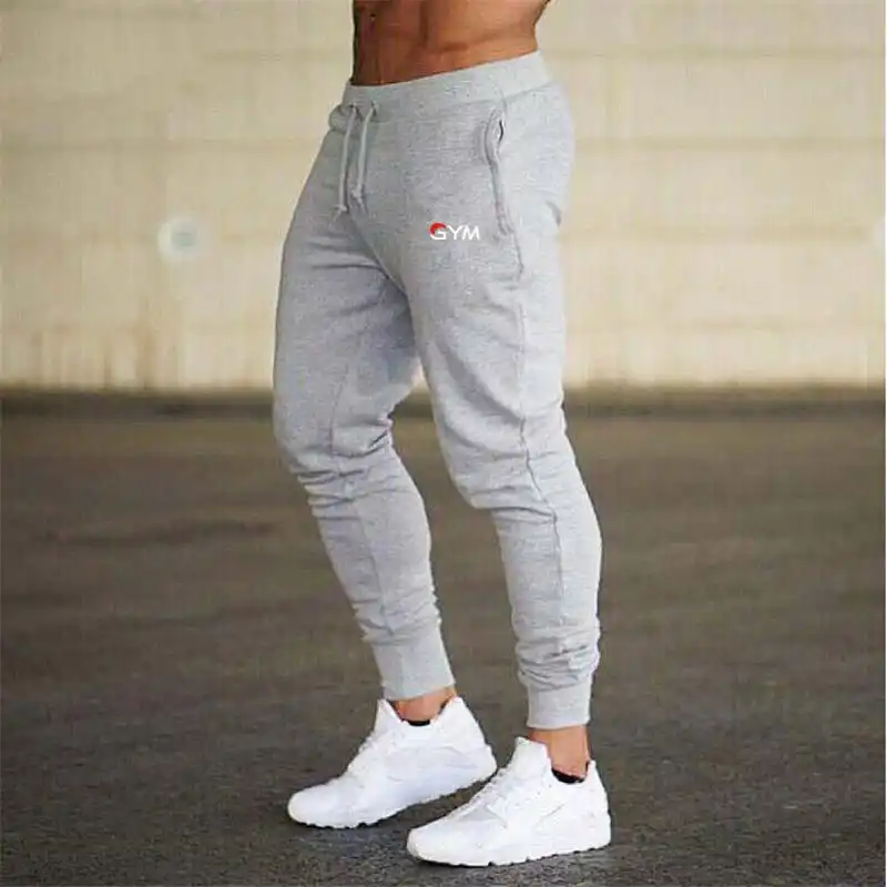 Nueva marca de pantalones deportivos con logotipo impreso para hombre,  pantalones de chándal informales para hombre, pantalones de chándal para  hombre, pantalones deportivos para culturismo|Pantalones ajustados| -  AliExpress