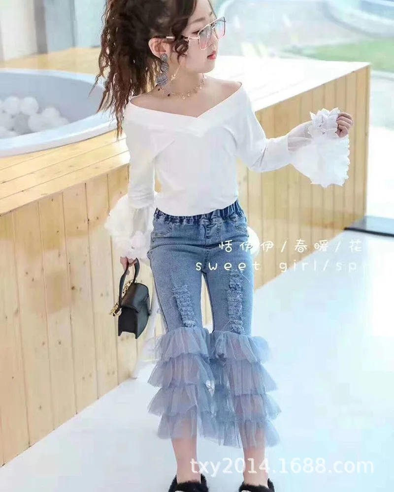 

2019 spring new children's clothing children's Korean mesh stitching fashion hole denim trousers