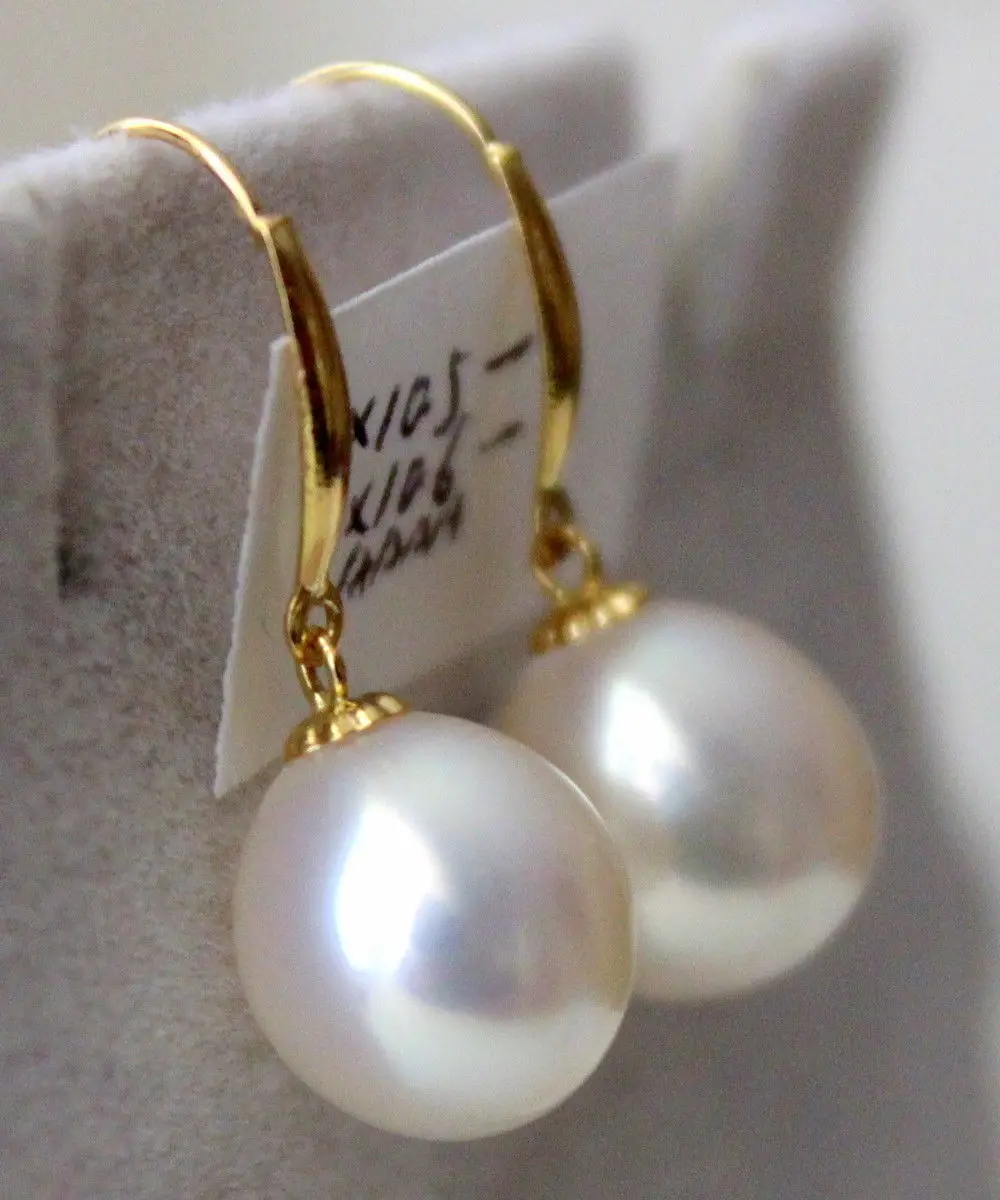 

stunninga pair of 12-13mm natural baroque white pearl earring14k