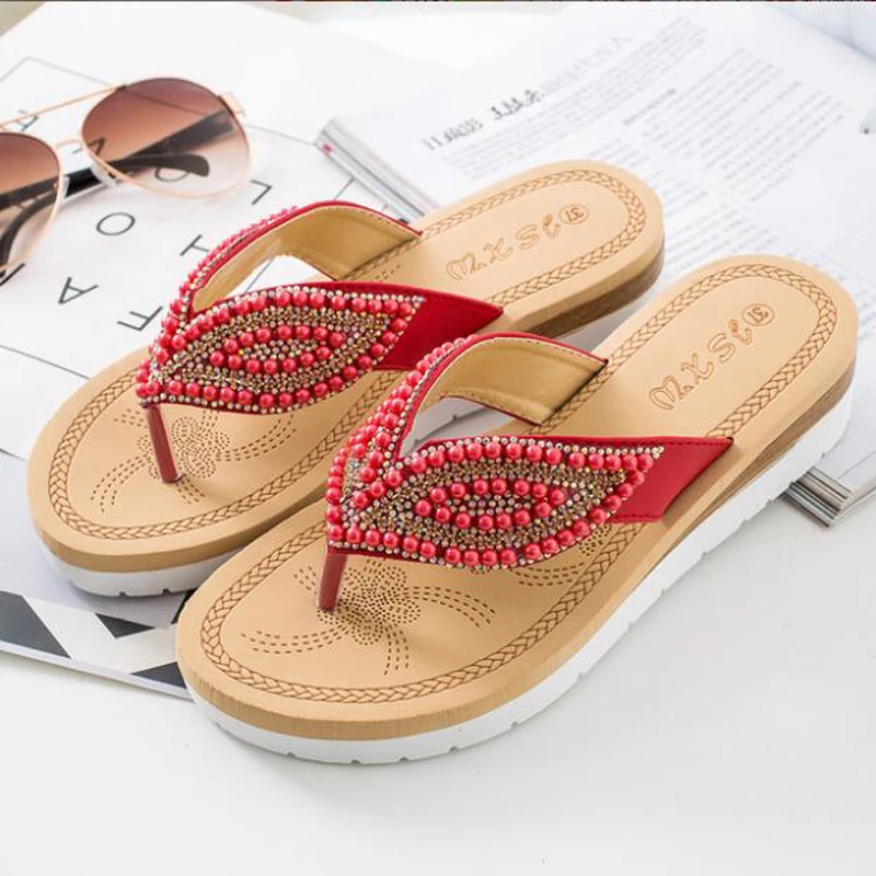 Online Neue Trend Strand Hausschuhe Strass Augen Persönlichkeit Perle Hausschuhe Mädchen Aus Lässig Sicken Kristall Flip Flops Rutsche Sandalen