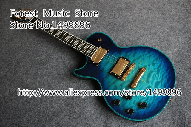 Cheap Chinese Gold Hardware Left Handed LP Custom Electric Guitars With Blue Binding Quilted Finish Guitar Body